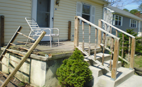 demolished porch and railing