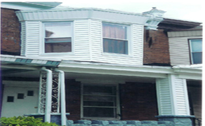 siding and yard for front of property